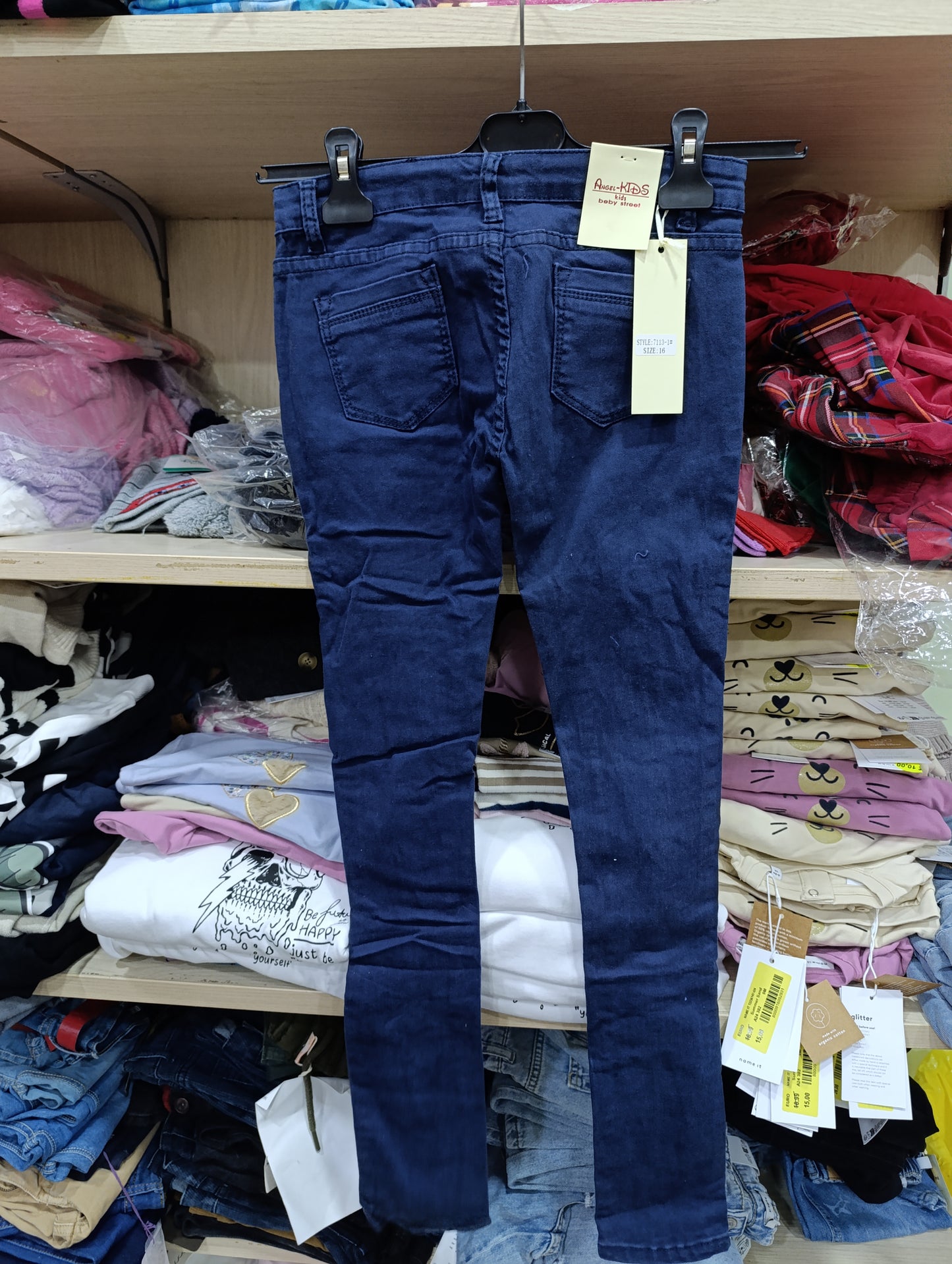Jeans bimba colore rosso  o blu a 3 euro
